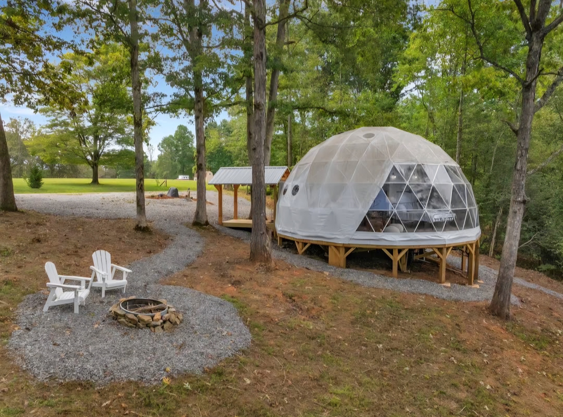 Geodesic dome structure on a timber deck foundation built by W's AllWorks in Cherokee County NC