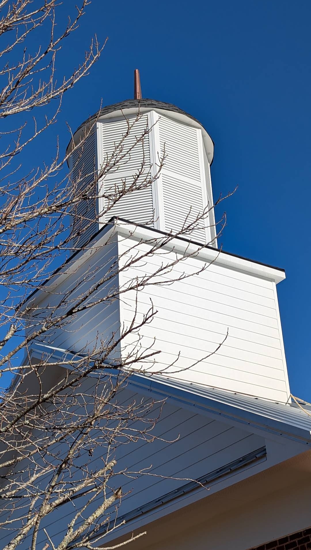 Restored steeple and cupola of Harshaw Chapel, a National Historic Registry building in Murphy NC restored by W's AllWorks